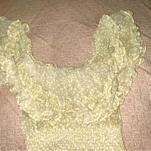Yellow off the shoulder ruffled dress